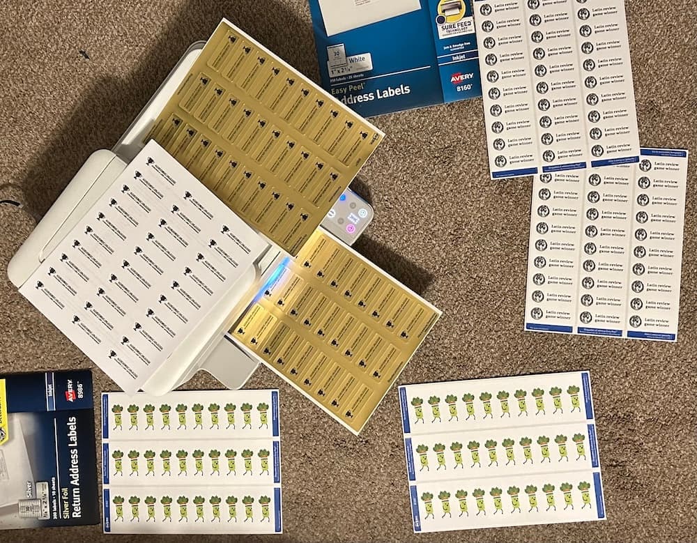 A home-printer printing sheets of Latin stickers